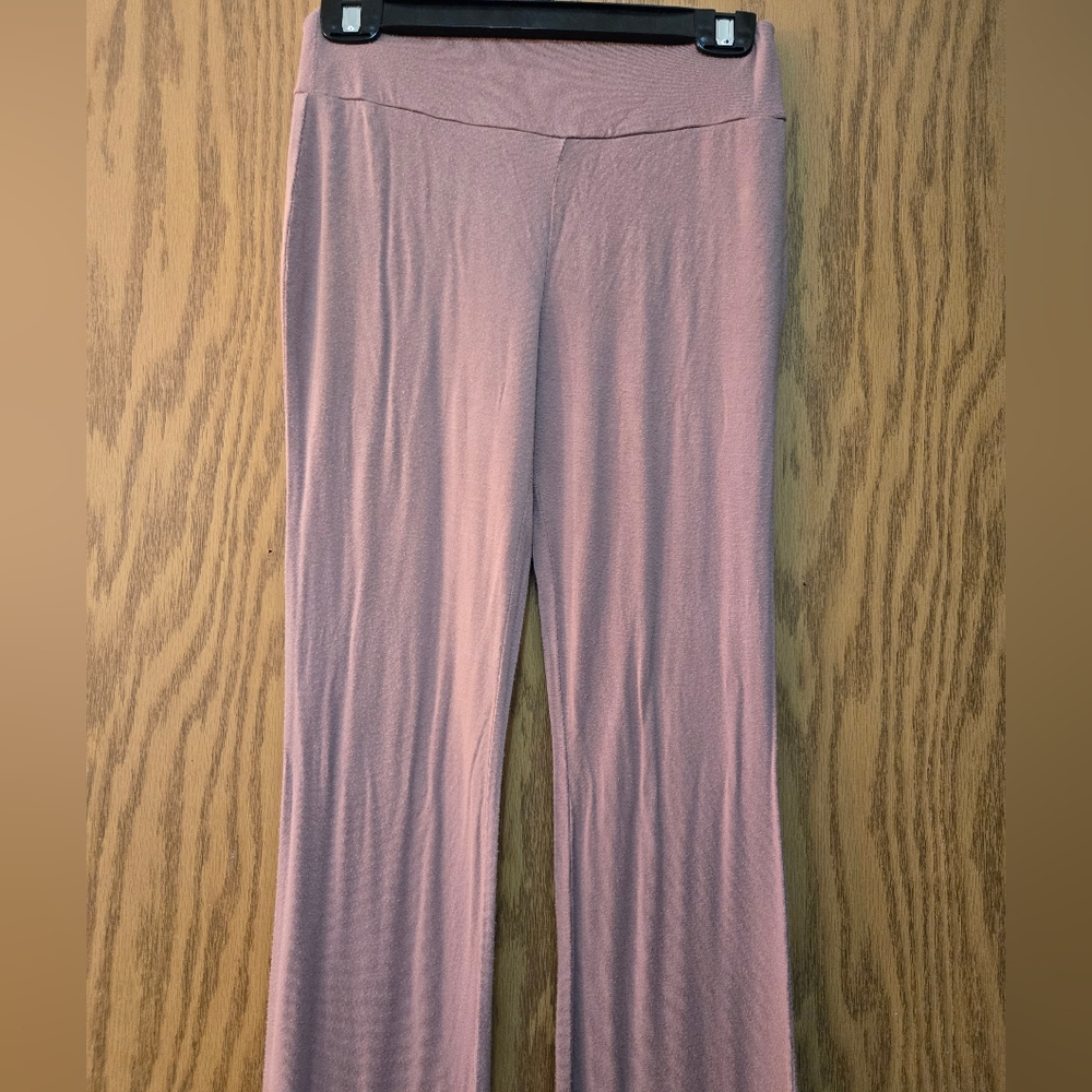 Cute light pink ladies pull on pants. Good condition. Size small.